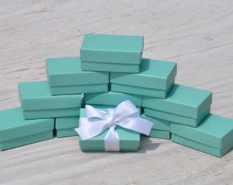 12 Pack Teal Green Cotton Filled Color Paper Cardboard Jewelry Box for Necklace, Ring, Earring, Pendant, Pocket Watch, Body Jewelry, Beads and Gems Size-3 1/16" x 2 1/8" x 1" - by R J Displays